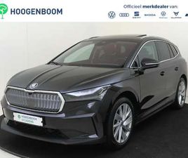 SKODA ENYAQ IV 80 BUSINESS EDITION | PANORAMADAK | TREKHAAK | HEAD-UP DISPLAY | 3-ZONE AIRCO | LEDEREN BEKLEDING | DODEHOEK DETECTIE | KEYLESS | ADAPTIEVE CRUIS