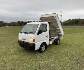 1997 SUZUKI CARRY DUMP. 4WD. DIFF LOCK. AXLE LOCK, A/C.
