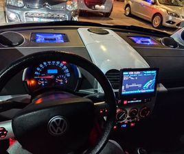 VOLKSWAGEN NEW BEETLE AUTO DEMO SOUND QUALITY BRAND ALPINE WRAPPATA