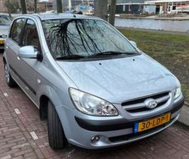 HYUNDAI GETZ 1.4 5DRS 2010 GRIJS MET WEINIG KM 118677 — HYUNDAI — MARKTPLAATS