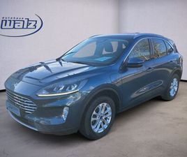 PLUG-IN HYBRID TITANIUM +KAMERA+PDC+NAVI+AH