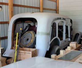 1936 PACKARD 120 CARVED PANEL HEARSE BY THE A.J. MILLER COMPANY