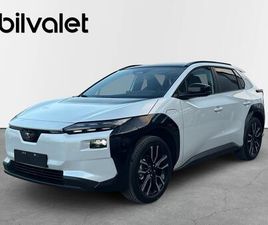 TOURING + 74.7 KWH AWD 343 HK