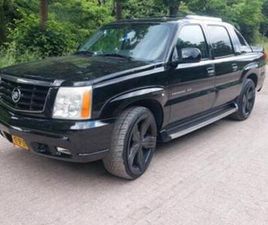 CADILLAC ESCALADE 6.0 V8 BENZINE/LPG | 4X4 GRIJS KENTEKEN — BESTELAUTO'S — MARKTPLAATS