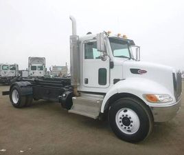 2011 PETERBILT 337 S/A ROLL-OFF TRUCK