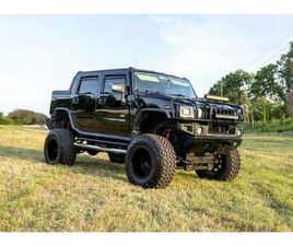 2007 HUMMER H2 SUT LIFTED ON 40S