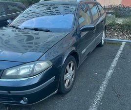IL TRAVAILLE DANS UNE RENAULT LAGUNA DE 2007.VOITURE