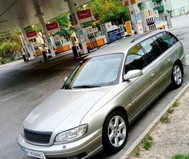 OPEL OMEGA BREAK OPEL OMEGA CARAVAN ELEGANCE 2,5 TD AUT.
