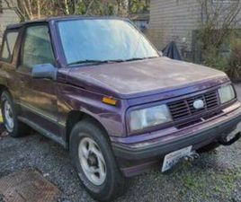 95 GEO TRACKER 2 DOOR CONVERTIBLE 4WD 5 SPEED