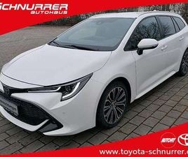 TOURING SPORTS 1,8-L-HYBRID CLUB