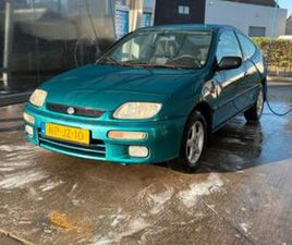 MAZDA 323 1.5 I COUPE LX AUT 1996 GROEN — MAZDA — MARKTPLAATS