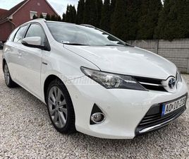 TOYOTA AURIS TOURING SPORTS TOYOTA AURIS TOURING SPORTS 1.8 HSD LOUNGE (AUTOMATA) KEYLESS/ÜVEGTETŐ/ÜLÉSFÜT./RADAR/KAMERA/TEMPOMAT/BLUETOOTH/PARK ASSIST/VALÓS KM!!