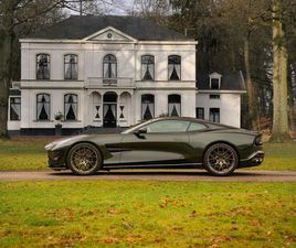 ASTON MARTIN VANQUISH - | MINOTAUR GREEN | BRONZE DREAMLINES | CARBON INTERIOR | STOELVENTILATIE