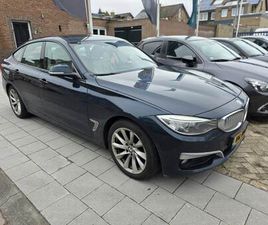 BMW 3-SERIE GRAN TURISMO 318D HIGH EXECUTIVE PANO AUTOMAAT NAVI CAMERA LEER