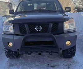 2014 NISSAN TITAN WITH SNOW PLOW INCLUDED