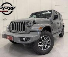 JEEP WRANGLER CONVERTIBLE UNLIMITED JEEP WRANGLER UNLIMITED 4XE 380 SAHARA SKYONE STING-GREY/CUS — JEEP — MARKTPLAATS