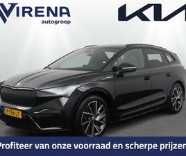 ŠKODA ENYAQ IV 80 KWH SPORTLINE - TREKHAAK WEGKLAPBAAR - SPORTSTOELEN - STOELVERWARMING - ACHTERUITRIJCAMERA - PANORAMA DAK - VIRENA ZEKERHEIDSPAKKET €895,-