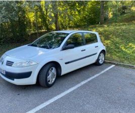 UTILITAIRE DEUX PLACES ET CAISSON SPÉCIAL À L’ARRIÈRE MEGANE
