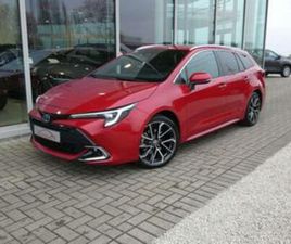 ② TOYOTA COROLLA 2.0 HYBRID 196PK PREMIUM +LEDER +TREKHAAK — TOYOTA — 2EMEMAIN