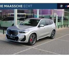BMW IX1 EDRIVE20 M SPORT / PANORAMADAK / TREKHAAK / SPORTSTO — BMW — MARKTPLAATS