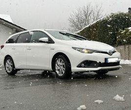 TOURING S. HYBRID 1,8-L-VVT TEAM DEUTS...