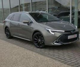 ② TOYOTA COROLLA 1.8 HYBRID 140PK PREMIUM+HEAD-UP DISPL.+SPORT — TOYOTA — 2EMEMAIN