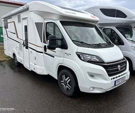 EURA MOBIL PROFILA 720 EB LÅNGBÄDD. STORT GARAGE. LÅGA MIL !!!