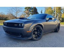 DODGE CHALLENGER ELADÓ! +4 DB AJÁNDÉK VERSENY FÉKPOFA!