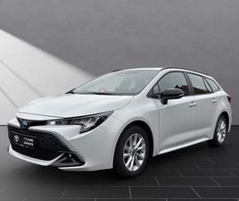 TOYOTA COROLLA TOURING SPORTS HYBRID BUSINESS EDITION
