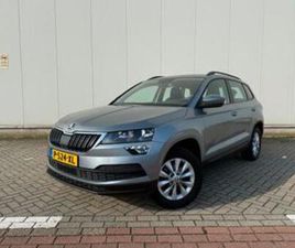 SKODA KAROQ 1.0 TSI GREENTECH 116 PK HAND 2019 GRIJS — SKODA — MARKTPLAATS