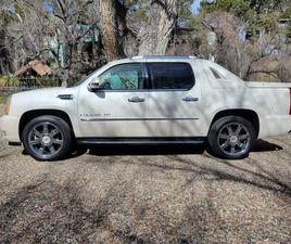 2007 CADI ESCALADE EXT AWD PEAL WHITE
