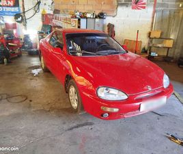 MAZDA MX3