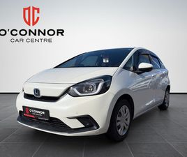 PURE WHITE, PURE EFFICIENCY — THE HYBRID THAT SMILES BACK AT YOU EVERY TIME YOU START IT