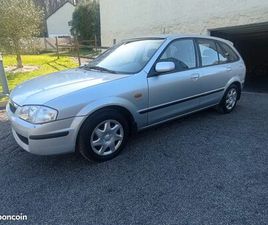 MAZDA 323F CT VIERGE 2ÈME MAIN PACK CLIM ESSENCE 1.5I 88CV 99 206 KM PACK CONFORT TBE ORIGINE FRANCE DOSSIER FACTURES 4 PNEUS NEUFS 3 CLEFS