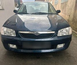 MAZDA 323 VOLLE SCHECKHEFT