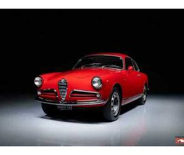 ALFA ROMÉO GIULIETTA SPRINT 1300 - ROSSO ALFA AVEC UN INTÉRIEUR EN TISSUE GRIS