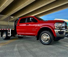 USED 2024 RAM 5500 SLT DRW 4WD DIESEL AISIN FLAT DECK GOOSE MAX TOW