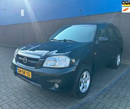 MAZDA TRIBUTE - 2.3I TOURING | TREKHAAK | AIRCO | DAKRAILS | PARKEERSENSOREN | EL. STOELEN | MULTIFUNCTION