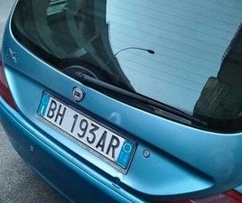 LANCIA Y ANNUNCIO AUTO