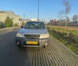 MAZDA TRIBUTE 2.0 EXCLUSIVE 4WD 2001 GRIJS — MAZDA — MARKTPLAATS