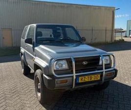 DAIHATSU FEROZA DAIHATSU FEROZA 1.6 CABRIOTOP 4WD 1997 GRIJS — DAIHATSU — MARKTPLAATS
