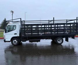 2017’ MITSUBISHI FUSO FE130 DIESEL 20FT FLATBED WITH RACKS 1OWNER,