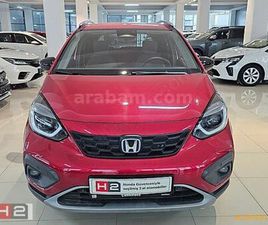 GALERIDEN HONDA JAZZ 1.5 HYBRID CROSSTAR EXECUTIVE 2024 MODEL İZMIR 6.050 KM KIRMIZI - 38498152 | ARABAM.COM