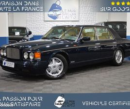 BENTLEY BROOKLANDS V8 6.7 R 305-08/1997-90.978KM-3ÈME MAIN-BLACK EMERALD MICA-CUIR INTÉGRAL BEIGE-INTÉRIEUR BOIS-CUIR ÉTENDU-SIÈGES ELECTRIQUES À MÉMOIRE-SIÈGES