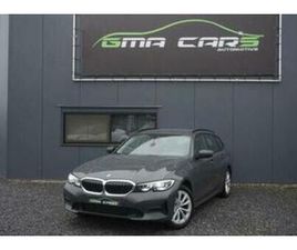 ② BMW 3 SERIE 318 IA TOURING BENZINE AUTOMAAT-NAV-PDC-AIRCO-GA — BMW — 2EMEMAIN