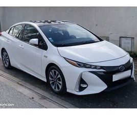 TOYOTA PRIUS PHV HYBRIDE RECHARGEABLE – TRÈS ÉCONOMIQUE - MOYENNE 2,1L/KM