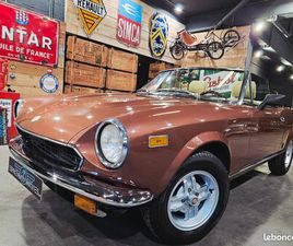 LIVRONS GRATUITEMENT A VOTRE DOMICILE, CE MAGNIFIQUE FIAT 124 SPIDER 2.0 DE QUALITE SUPERIEURE