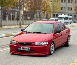 SAHIBINDEN MAZDA 323 1.5 FAMILIA 1997 MODEL ÇORUM 335.000 KM KIRMIZI - 38951079 | ARABAM.COM