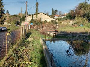 A vendre terrain avec bassins
