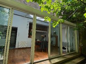 Petite maison avec jardin dans l’hypercentre  en lisière du triangle d’or